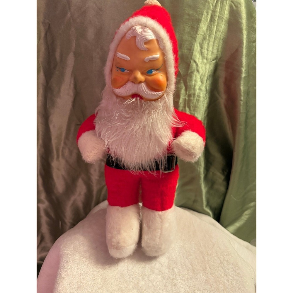 Vintage rubber face Santa genie toys